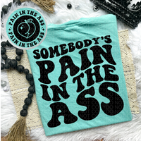 Somebody’s Pain In The A** Tee